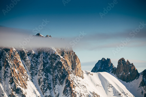 View from Aiguille du Midi, France. Skiers going down on Mer de Glace .