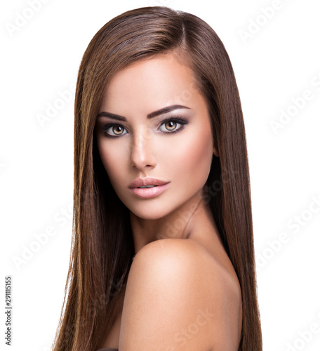 Portrait of Beautiful young woman with long straight brown hair.
