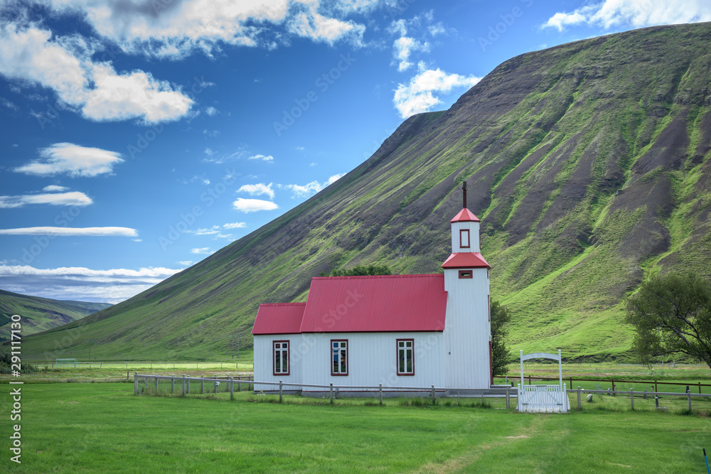 Beautiful small red roof church in Iceland