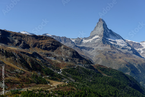 Amazing View of the mountain Matterhorn  Zermatt  Valais in the Swiss Alps  blue sky  no clouds in early autumn.