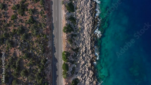 Scenic view of the road along the azure coast of the sea. Aerial view.