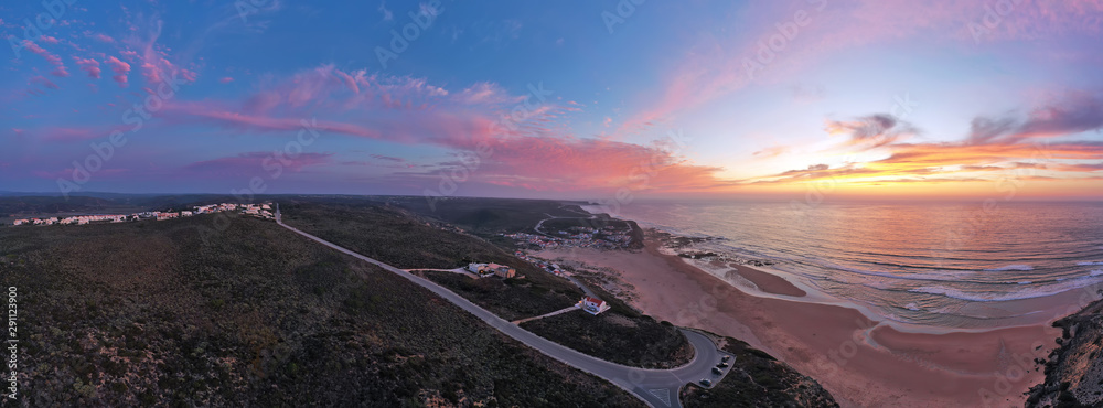 Fototapeta premium Panorama aerial from Monte Clerigo at the west coast in Portugal at sunset