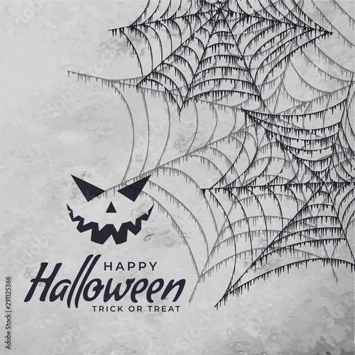 spider cobweb with scary face halloween background