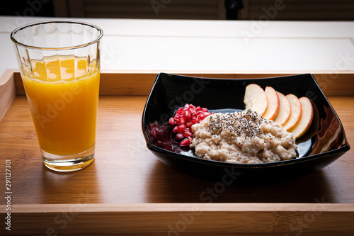 healthy breakfast, oatmeal porridge, fruits and orange juice
