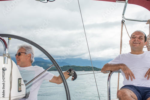 Sailing with friend at sea in beautiful day