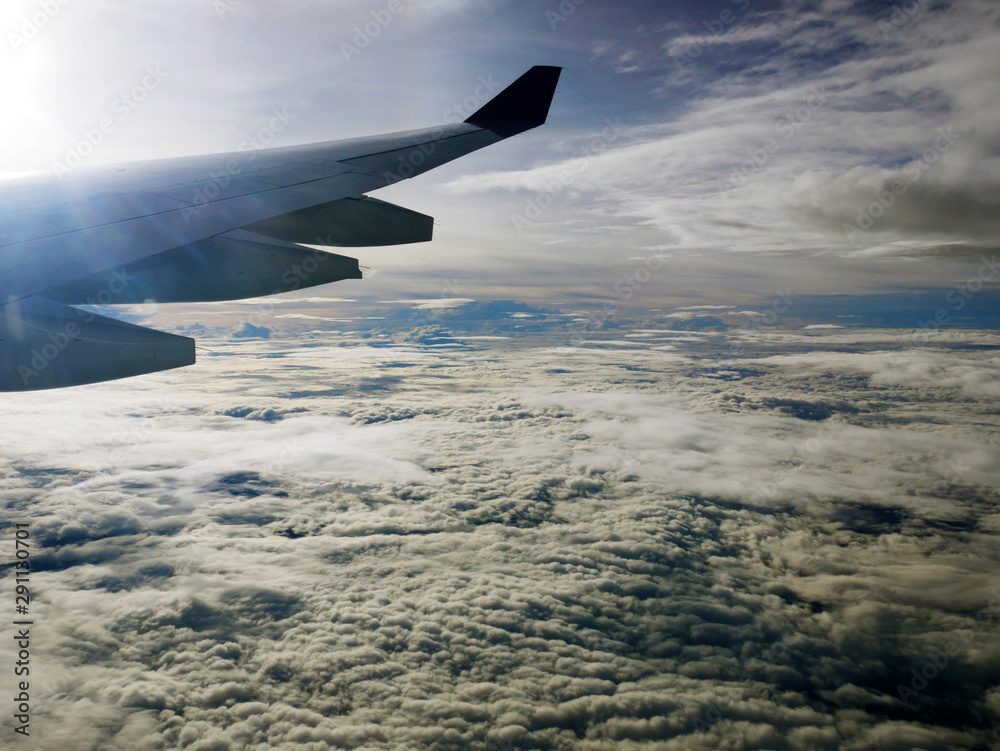 Fototapeta premium Beautiful high angle view and cloud sky background from the capital's aircraft.