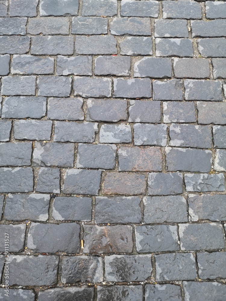 Stone pavers on red square