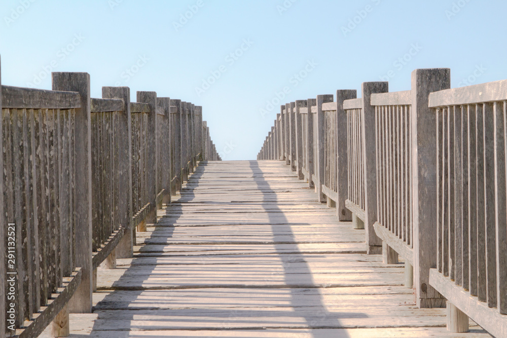 Ancient wooden walkway brigde ascending