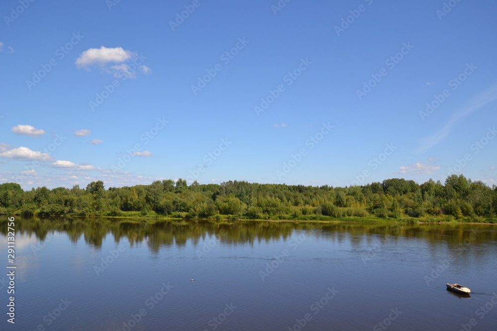 Sunny summer day on the banks of river Colva, Urals
