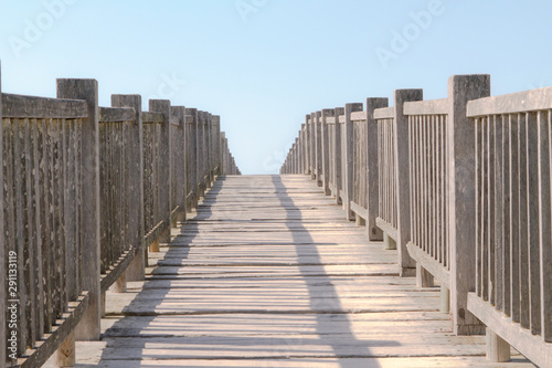 Ancient wooden walkway brigde ascending © Juan