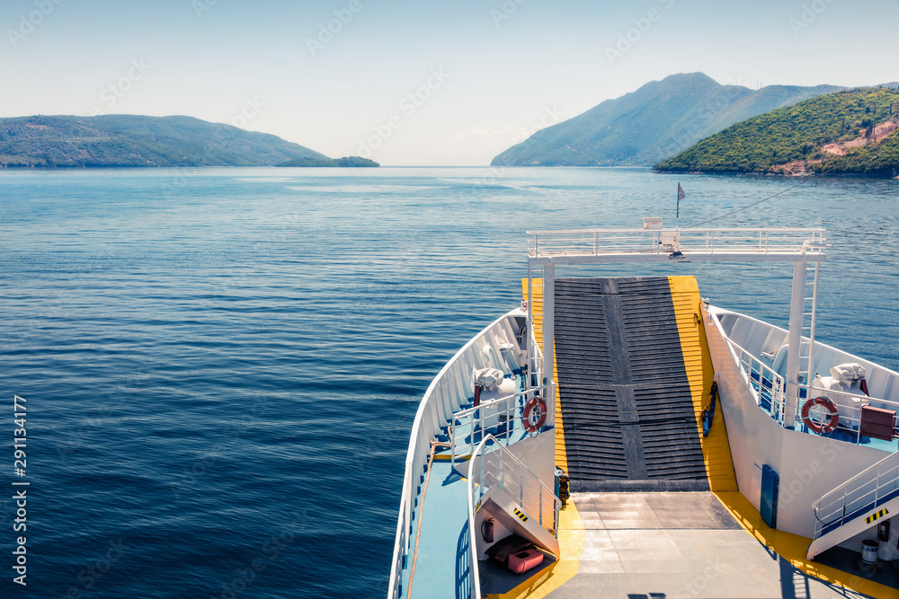Treveling by ferry between Ionian Islands. Splandid morning seascape of Ionian Sea. Picturesque spring view of Greece, Europe. Traveling concept background.