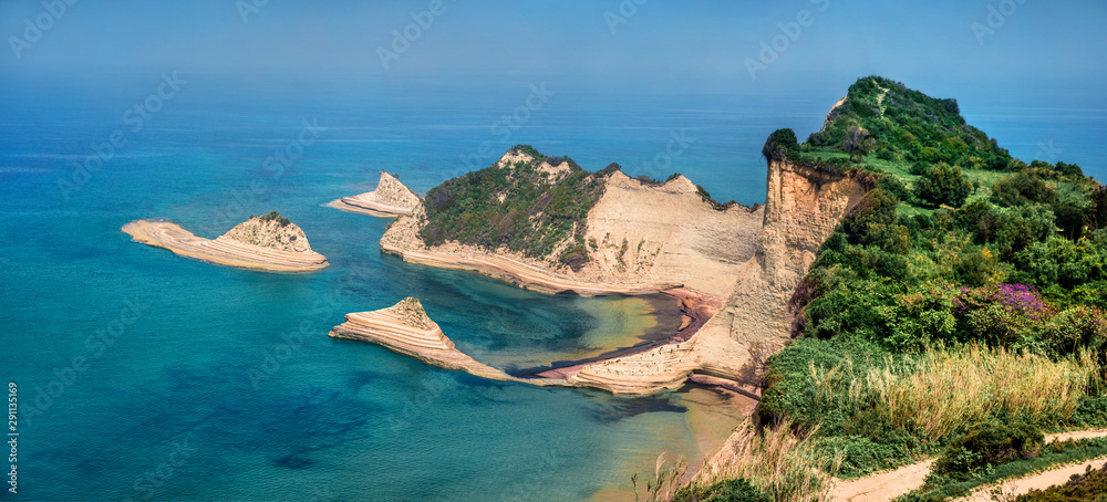Panoramic view of Cape Drastis thematic park. Impressive morning seascape of Ionian sea. Beautiful outdoor scene of Corfu island, Greece, Europe. Beauty of nature concept background.