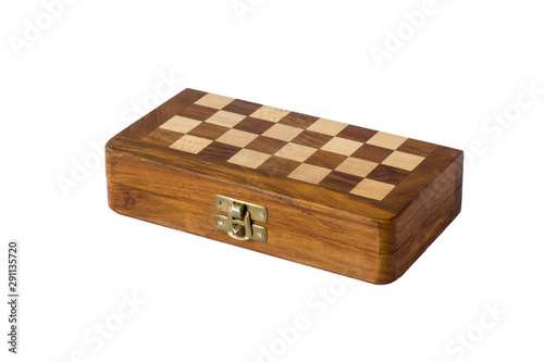 closed chessboard with wooden drawing closeup isolated on white background