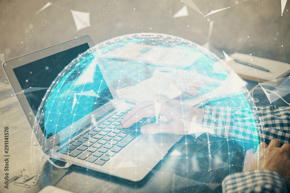 Multi exposure of businessman working on laptop on background. International business hologram in front. Concept of success. Multi exposure of businessman working on laptop on background. International business hologram in front. Concept of success.