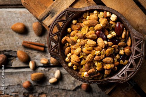 Healthy nuts mix in a wooden bowl
