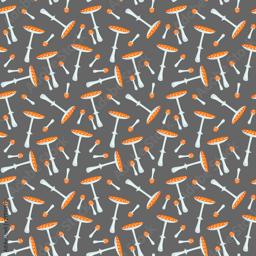 Seamless pattern of red mushrooms on a grey background