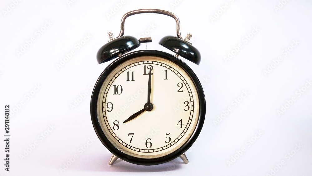 old alarm clock isolated on white background old alarm clock isolated on white background