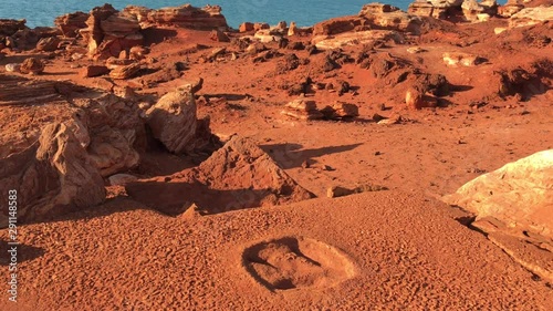 Dinosaur footprint in Gantheaume point Broome Western Australia photo