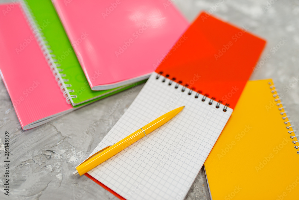 Notebook and pencil on the table, stationery store Notebook and pencil on the table, stationery store