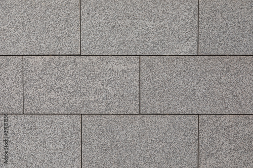 Elevated view of shiny granite tile surface inside building