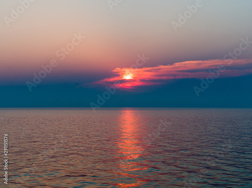 Beautiful pink sunset over the sea - aerial view