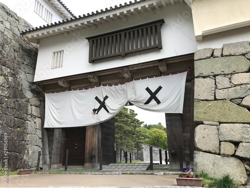 Japanese Castle Gate with Family Symbols at Nihonmatsu Castle in Fukushima, Japan photo