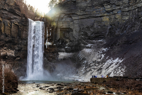 Taughannock Falls is a 215-foot plunge waterfall  that is the highest single-drop waterfall east of the Rocky Mountains  located about 10 miles north of Ithaca in New York State  USA  at winter.