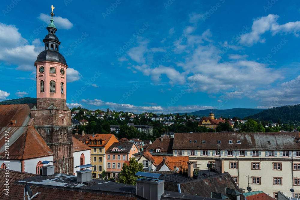 view of Baden Baden with the Stiftskirche church under a blue sky