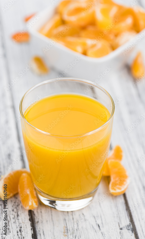 Homemade Tangerine Juice (close-up shot) Homemade Tangerine Juice (close-up shot)