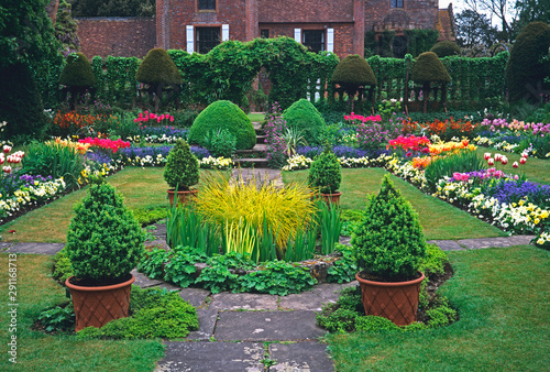 The colourful Tulip spring borders and display in a country house garden