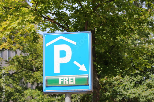 Car parking available sign Berlin Germany. Translation for German - Free.