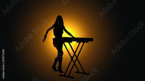  Female keyboard player backlit.mov photo