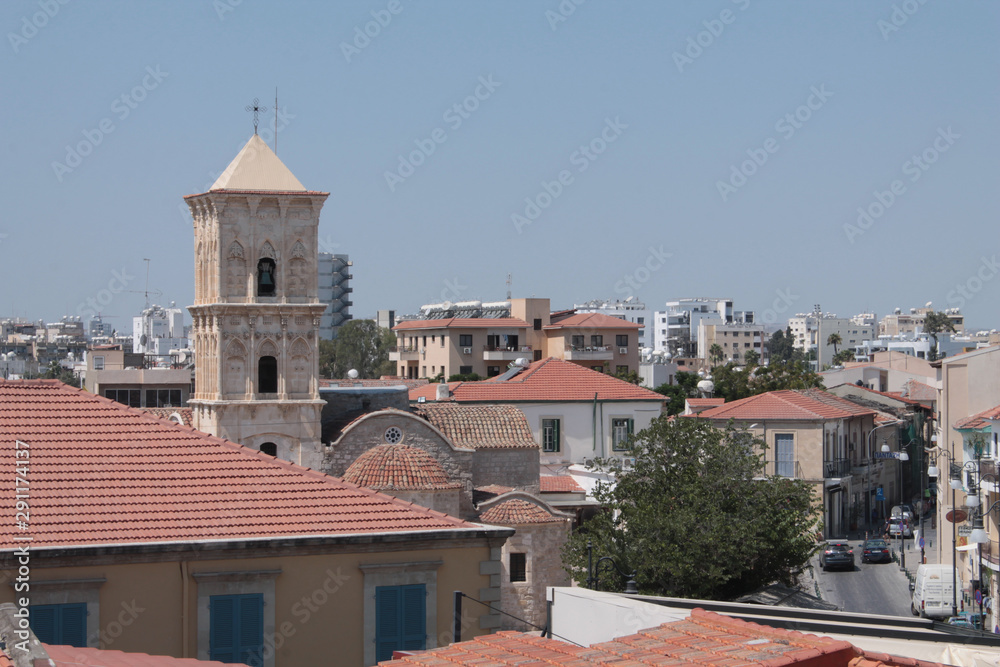 Church of St. Lazarus in Larnaca. Famous landmark. View from above. In the frame, the roofs of other buildings and a view of the street.