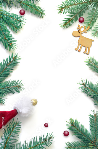 Fir branch and deer on white background with copy space for text. Christmas