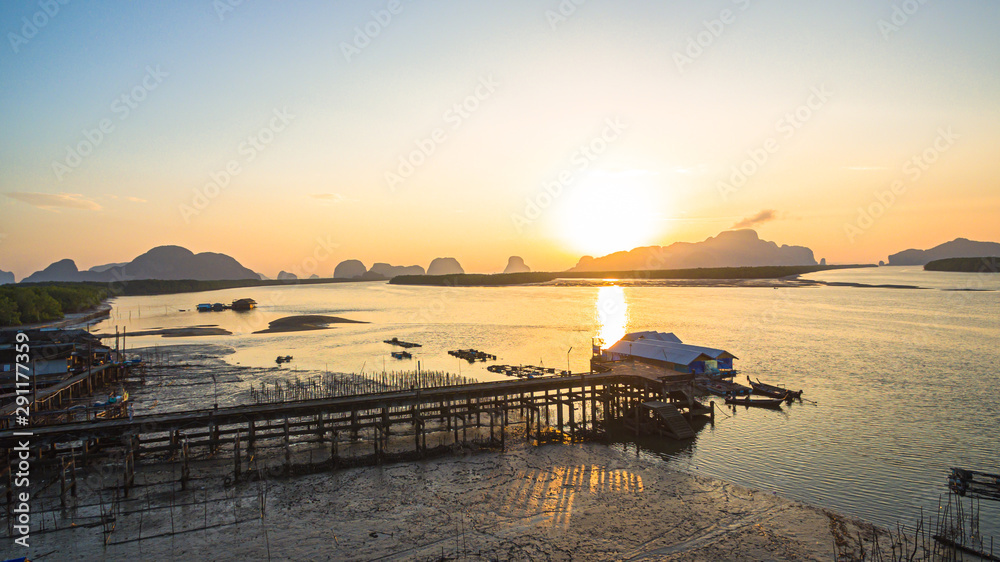 Fototapeta premium aerial view Bansamchong fishing village inside the large wetland