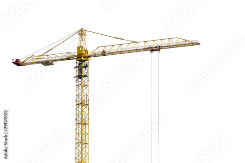 Yellow construction crane on a white isolated background builds multi-storey residential buildings using modern technologies of metal, concrete and brick according to the architectural design