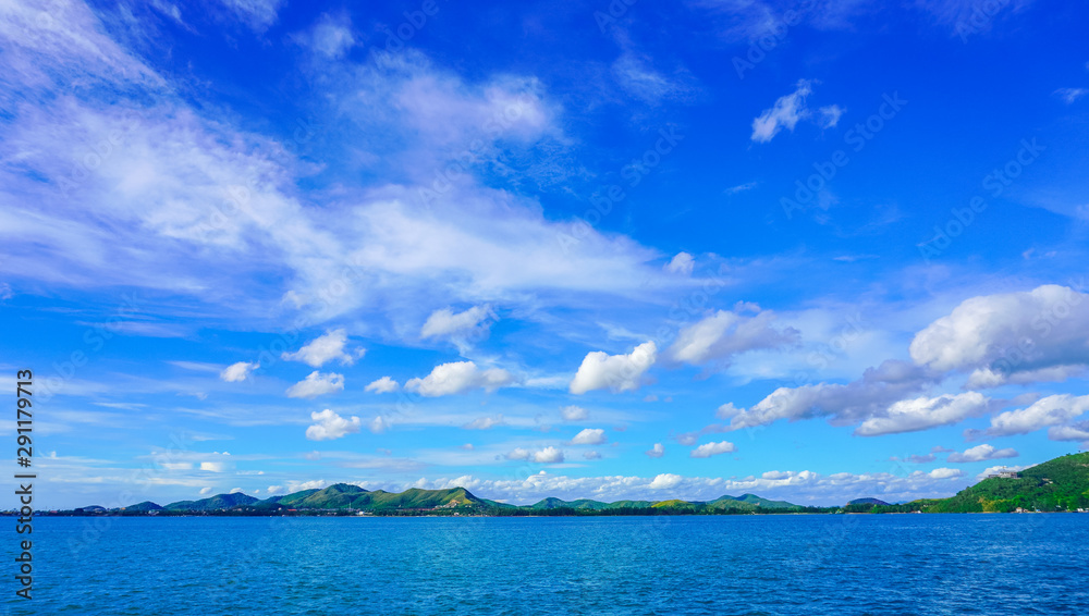 landscape of sea and island and beautiful cloudy during the sunny day.