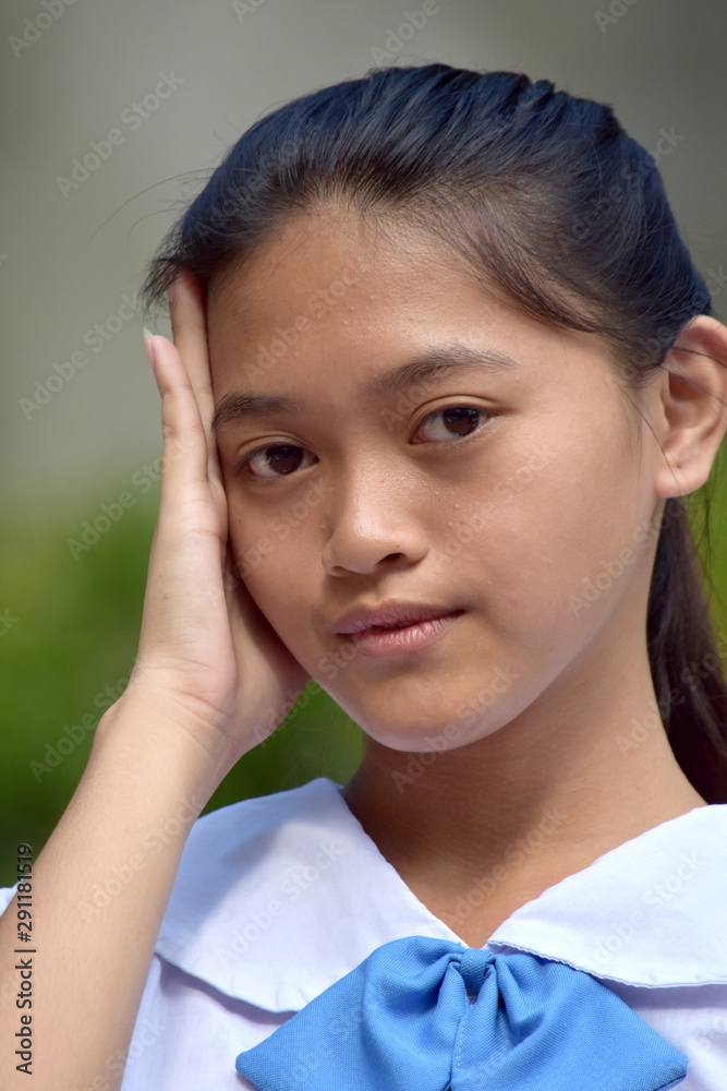 A Stressed Young Asian Person A Stressed Young Asian Person