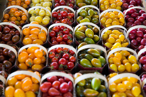 Baskets with varieties of cherry tomatoes.