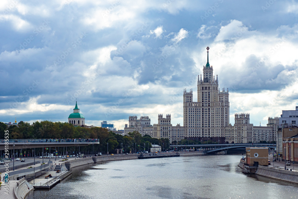 View of Moscow on a cloudy day. River Moscow.High-rise building on Kotelnicheskaya embankment. Park Zaryadye. Pedestrian platform over the river. Business card of Moscow. View of the capital of Russia View of Moscow on a cloudy day. River Moscow.High-rise building on Kotelnicheskaya embankment. Park Zaryadye. Pedestrian platform over the river. Business card of Moscow. View of the capital of Russia