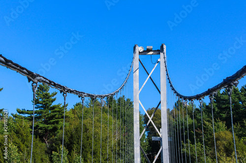 Pier and cable of suspension bridge, Gorge park, Coaticook, Quebec photo