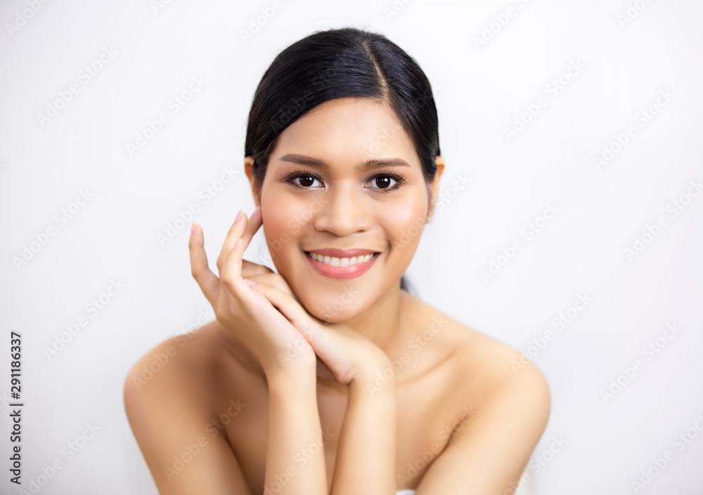 PoBeautiful Young Woman with Clean Fresh Skin touch own face . Facial treatment. Cosmetology , beauty and spa against white backgrourtrait Of Shirtless Woman with clear skin care Over white Background PoBeautiful Young Woman with Clean Fresh Skin touch own face . Facial treatment. Cosmetology , beauty and spa against white backgrourtrait Of Shirtless Woman with clear skin care Over white Background