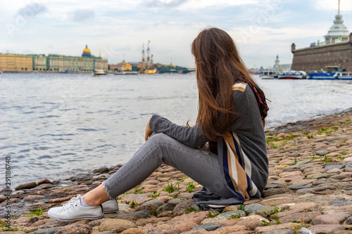 The girl admires the view o...
