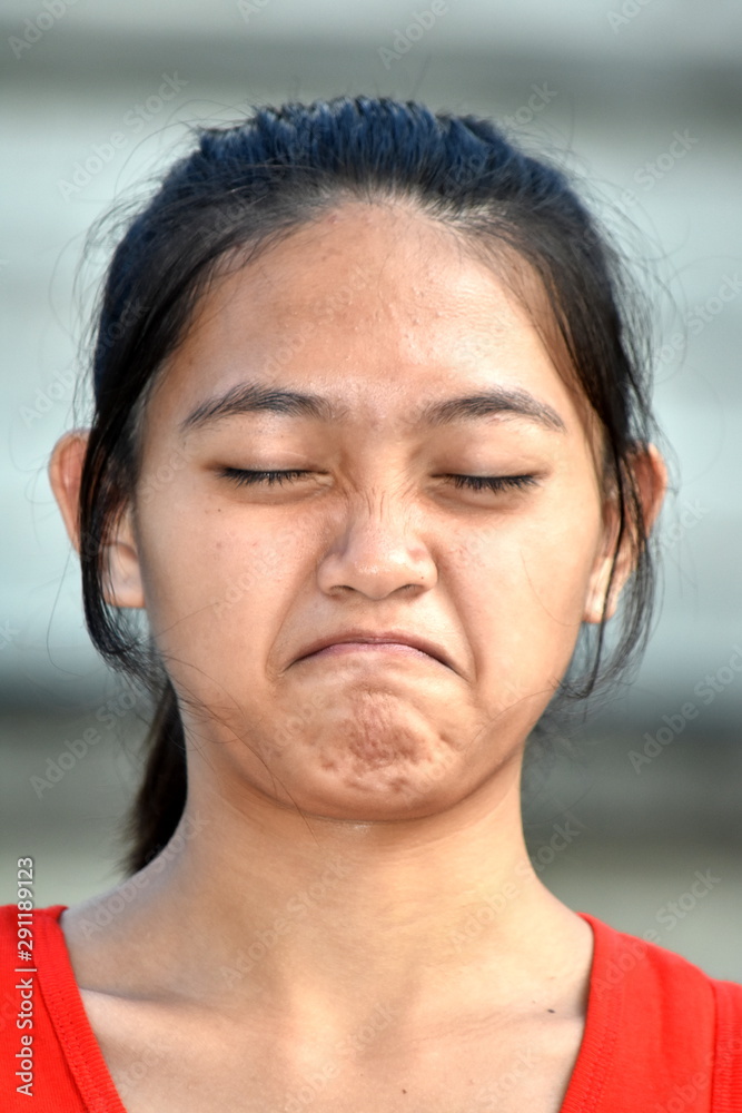 Obraz premium A Beautiful Minority Female Under Stress