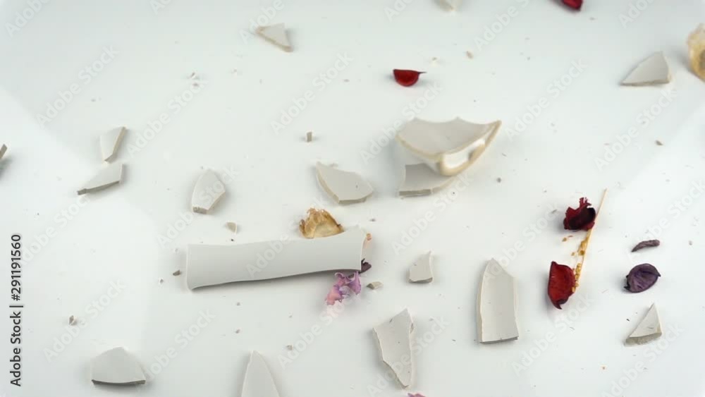 The concept of destruction. Falling and breaking decorative vase in slow motion.