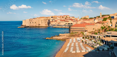 Sunny morning view of of Dubrovnik city with Banje Beach and Fort Bokar on background. Splendid summer panorama of Croatia, Europe. Beautiful world of Mediterranean countries.