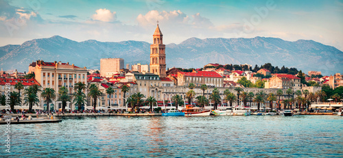 Colorful evening panorama of Split city with Diocletian palace. Splendid summer seascape of Adriatic sea, Croatia, Europe. Beautiful world of Mediterranean countries. Traveling concept background. photo