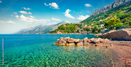 Fototapeta Naklejka Na Ścianę i Meble -  Romantic morning seascape of Adriatic sea. Bright summer view of small beach in famous resort - Brela, Croatia, Europe. Beautiful world of Mediterranean countries.