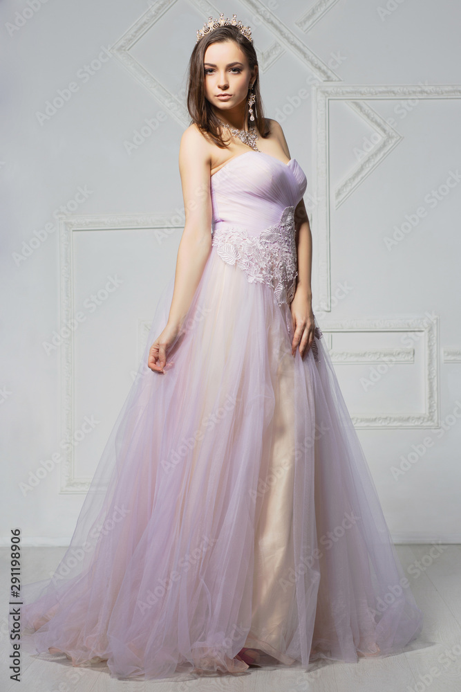 Attractive young woman posing in the studio. Attractive young woman posing in the studio.