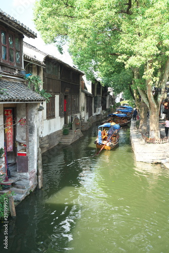 Zhouzhuang,China-September 17, 2019: Boats in Zhouzhuang passing through canal photo